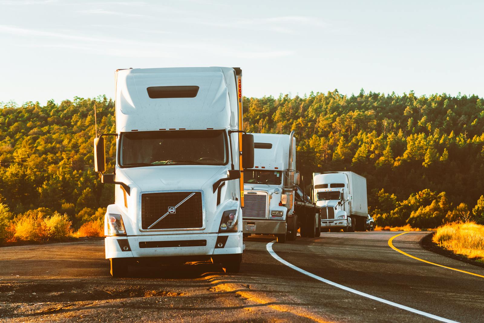 Convoy of trucks on a regional highway